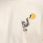 Kaotiko Cowgirl Snake Organic Cotton Ivory T-shirt AR064-01S-G002